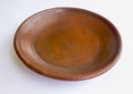 earthenware plate isolated on white background. earthenware crafts. Royalty Free Stock Photo