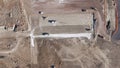 Earthmoving equipment. Aerial view of a large construction site with several earthmoving machines. Royalty Free Stock Photo