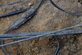 Earthwork, failure. Cables in an earth trench, protection Royalty Free Stock Photo