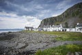 Easdale Village houses in Argyle with a stormy looking sky