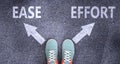 Ease and effort as different choices in life - pictured as words Ease, effort on a road to symbolize making decision and picking