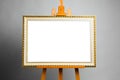 Easel with painting frame Royalty Free Stock Photo