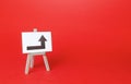 Easel with a right turn arrow. Minimalism. Direction to go around on the left. Advertising. Obscure obstacles, move towards