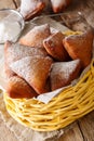 East African Mandazi dabo donuts with powdered sugar close up