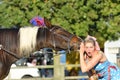 East Anglia Equestrian Fair shocked girl listening to talking horse