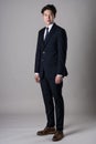 East Asian businessman shooting studio portrait photo