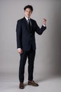 East Asian businessman shooting studio portrait photo