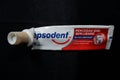 A toothpaste that has run out. Pepsodent.