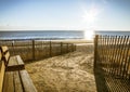 East coast beach entrance with wood fence walkway through sand to isolated beach in the morning Royalty Free Stock Photo