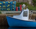 East Coast lobster fishing boat with colorful traps Royalty Free Stock Photo