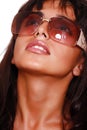 East girl in sunglasses looks in the sky Royalty Free Stock Photo