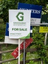 Property for sale signs in East Grinstead on June 11, 2020