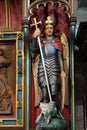 Wooden statue of George slaying the dragon in St Swithuns Church , East Grinstead,
