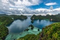 East Misool, group of small island in shallow blue lagoon water