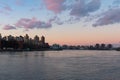 The East River between Astoria Queens and Roosevelt Island in New York City during a Sunset