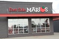 tor, canada - august 10, 2023: east side marios restaurant front logo sign above facade and windows. p Royalty Free Stock Photo