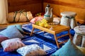 East. small table with jug and grapes. traditional textiles