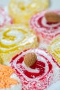 East sweetnesses of lucumas yellow, red in coconut shaving, Royalty Free Stock Photo