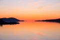 East view of the St. Lawrence River just before sunrise, with Cape Tourmente and the Island of Orleans seen in silhouette