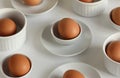 Easter abstract minimalist concept pattern with eggs and ceramics white plates and dishes