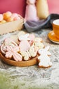 Easter aesthetics glazed cookies on the festive table close up