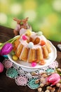 Easter almond ring cake on wooden table