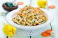 Easter appetizer mixed salad with chicken breast, corn, carrot Royalty Free Stock Photo