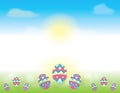 Easter Background with Blue Skies and Easter Eggs decorated in the green grass