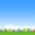 Easter background and colorful Easter eggs in green grass for Ea