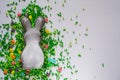 Easter background with cookie cutter and sugar sprinkles Royalty Free Stock Photo