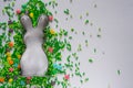 Easter background with cookie cutter and sugar sprinkles Royalty Free Stock Photo