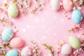 Easter background with eggs, flowers, bokeh and copy space