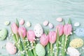 Easter background from eggs and spring flowers. Top view. Royalty Free Stock Photo