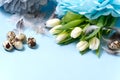 Easter background with eggs and white tulips. Royalty Free Stock Photo