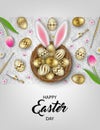 Easter background with gold eggs in the nest with rabbit ears and flowers Royalty Free Stock Photo