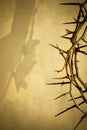 Easter background illustration with Crown of Thorns on Parchment Paper and Jesus Christ on the Cross faded in. Royalty Free Stock Photo