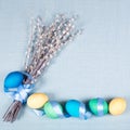 Easter background with painted eggs, pussy-willow and ribbon Royalty Free Stock Photo