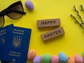 Easter background with passports, sunglasses, colorful eggs and white rabbit