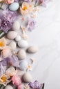 Easter background with spring flowers and eggs on light marbled table. Top view, flat lay style, copy space. Paschal frame, card, Royalty Free Stock Photo