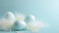 Easter background white feathers and blue eggs