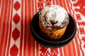 Easter cake in a clay plate on an embroidered Ukrainian towel Royalty Free Stock Photo