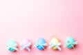 Easter banner. Colourful egg with tape ribbon on pastel pink background in Happy Easter decoration. Foil minimalist egg design,