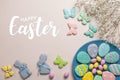 Easter banner on a pastel background. Homemade gingerbread cookies on a blue plate, Easter eggs and cookies in the shape of a