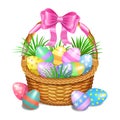 Easter basket with color painted easter eggs on white Royalty Free Stock Photo