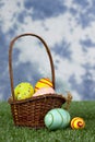 Easter basket and eggs in grass Royalty Free Stock Photo