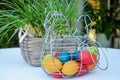 Easter basket filled with colored eggs Royalty Free Stock Photo
