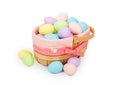 Easter basket with pastel colored plastic eggs Royalty Free Stock Photo