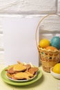 Easter blank vertical card with basket with colored eggs