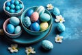 Easter Bliss: A Vibrant Display of Easter Eggs on a Blue Table