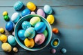 Easter Bliss: A Vibrant Display of Easter Eggs on a Blue Table